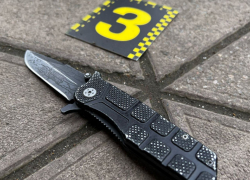 В Запорожье полицейский открыл огонь по вооружённому мужчине